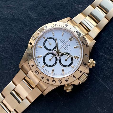 rolex 18k yellow gold daytona black diamond dial model 16528